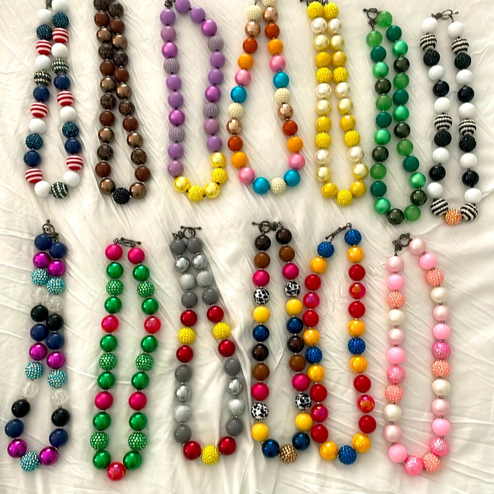 Set of 13 statement necklaces - large beads. Disney-style colors and themes.